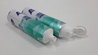 L'emballage mat en plastique de tube de stratifié de tube de pâte dentifrice de toucher doux, les tubes cosmétiques vides a givré le matériel avec le chapeau de docteur